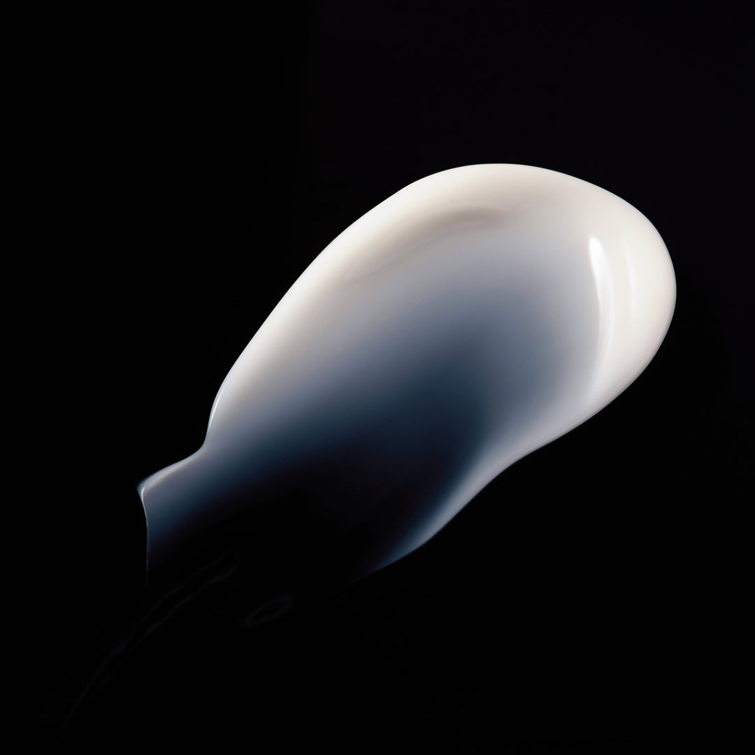 Regelica Bakuchiol + Niacinamide Anti-aging Cream texture in a dark background